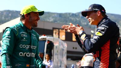 Max Verstappen with Fernando Alonso, who is under contract at Aston Martin until 2026. Getty Images