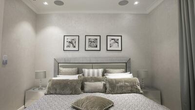 One of the guest bedrooms. The villa comes with what its brokers claim to be the most comprehensive home control system in the UAE where you can remotely switch on lights, security systems, air conditioning, water heating, fountains, blinds, TVs and sound systems in every room of the house or garden via iPads or from your mobile phone anywhere in the world. Mona Al Marzooqi / The National