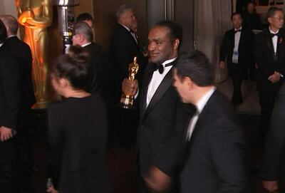 A still image from AP video appears to show the man who authorities say stole Frances McDormand's best actress Oscar walking out of the official Academy Awards after-party in Los Angeles. Jeff Turner / AP photo