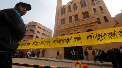 Police tape cordon is seen at the site of attack on a church in the Helwan district south of Cairo. Amr Abdallah Dalsh / Reuters