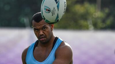 Australia full-back Kurtley Beale takes part in kicking drills. AFP