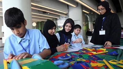Pupils from Hamdan Bin Zayed School participate in Make it engineering and manufacturing competition at the Khalifa University in Abu Dhabi. Satish Kumar / The National
