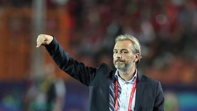 Uganda head coach Sebastien Desabre gives instructions from the sidelines. EPA
