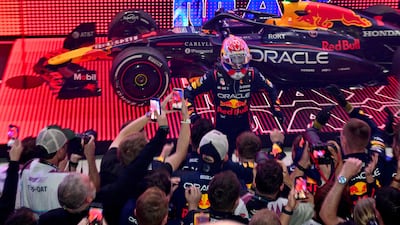 Max Verstappen celebrates with his Red Bull team at the Lusail International Circuit. AFP
