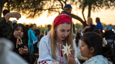 Ms Kryklyvets with children at a workshop during the event