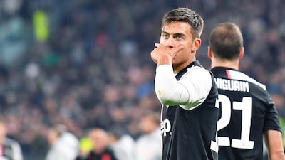 epa07987033 Juventus' Paulo Dybala (L) reacts next to teammate Gonzalo Higuain (R) after scoring the 1-0 lead during the Italian Serie A soccer match between Juventus FC and AC Milan in Turin, Italy, 10 November 2019. EPA/ALESSANDRO DI MARCO