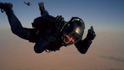 A screengrab from a video showing Tom Cruise skydiving down to a desert in Abu Dhabi as part of a stunt for Mission Impossible: Fallout. Courtesy Mission: Impossible Twitter