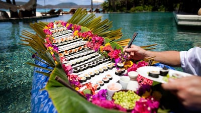 Floating sushi canoe at Necker Island. Courtesy Virgin Limited Edition