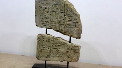 A tablet on display at the Iraqi National Museum after it was returned by Lebanon. AFP