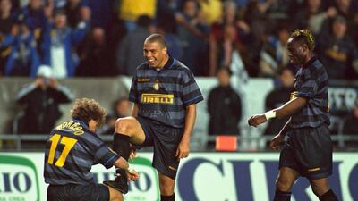 If anyone's boots deserved a regular buffing, it was the Brazilian great Ronaldo. After scoring Inter Milan's third goal in their Uefa Cup final victory over Lazio in Paris, the attacker was given a mock shoe shine by teammate Francesco Moriero. Reuters
