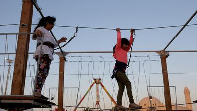 There’s also a separate area for 2- to 8-year-olds, a carousel and a Simpsons-inspired bouncy castle and slide. Sammy Dallal / The National