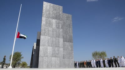 Sheikh Mohammed bin Zayed, Crown Prince of Abu Dhabi and Deputy Supreme Commander of the UAE Armed Forces, observes a moment of silence during a Commemoration Day flag raising ceremony at Wahat Al Karama, a memorial dedicated to the memory of the UAE’s national heroes in honour of their sacrifice and in recognition of their heroism. He is seen with Major General Sheikh Khaled bin Mohammed bin Zayed, Chairman of the UAE State Security Department, Sheikh Khalifa bin Tahnoun bin Mohamed Al Nahyan, Lt General Hamad Al Romaithi, Chief of Staff UAE Armed Forces, Major General Essa Saif Al Mazrouei, Deputy Chief of Staff of the UAE Armed Forces, Mohammed Mubarak Al Mazrouei, Undersecretary of the Crown Prince Court of Abu Dhabi, and others. Mohamed Al Hammadi / Crown Prince Court - Abu Dhabi