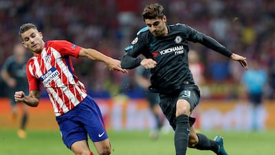 Atletico Madrid's Lucas and Chelsea's Alvaro Morata challenge for the ball. Francisco Seco / AP Photo
