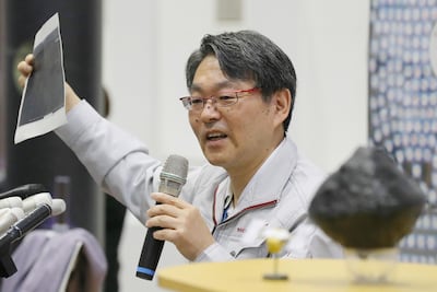 Takashi Kubota, research director at the Japan Aerospace Exploration Agency, speaks to journalists after the Hayabusa2 probe's touchdown on the asteroid Ryugu on July 11, 2019. Jiji Press / AFP