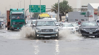 Vehicles battle hazardous road conditions in Al Quoz, Dubai. Leslie Pableo for The National