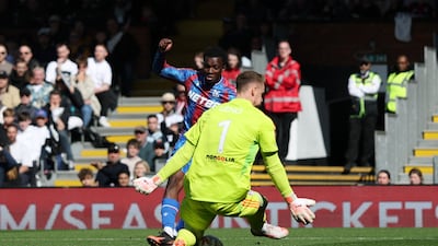 Palace susbstitute Eddie Nketiah slots the ball under Fulham goalkeeper Bernd Leno in the 75th minute to make it 3-0. Reuters