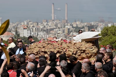 Lebanese Maronite monks carry the coffin of late Lebanese Maronite Patriarch Nasrallah Sfeir in Bkirki, northeast Beirut. Wael Hamzeh / EPA