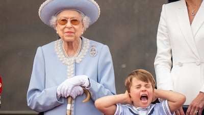 Queen Elizabeth II and Prince Louis on the balcony of Buckingham Palace, to view the platinum jubilee flypast. Taken by Aaron Chown. PA