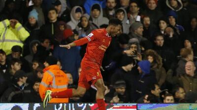Daniel Sturridge celebrates his goal against Fulham on Wednesday. Sang Tan / AP
