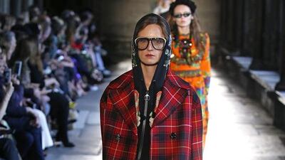 A punk edge with bleached jeans and tartan coat for Look 46 at the Gucci Cruise Collection 2017. Courtesy Gucci.
