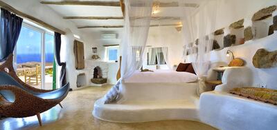 The master bedroom at Residence MK0417, listed by Algean Property in Lia Bay, Mykonos