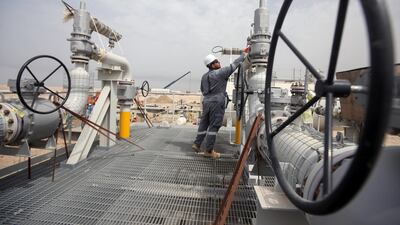 A worker is seen at Iraq's Majnoon oilfield near Basra, southern Iraq. Iraq exported nearly 3.4 million bpd in February, including oil sold through Ceyhan, but reduced its volumes considerably to 3.2 million bpd in March, according to Kpler data. REUTERS