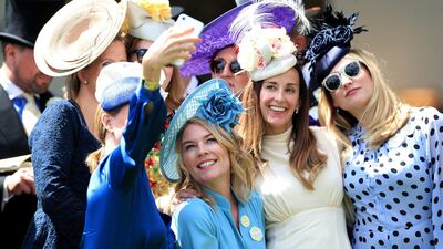 Autumn poses for a picture with racegoers. Mike Egerton / PA Wire