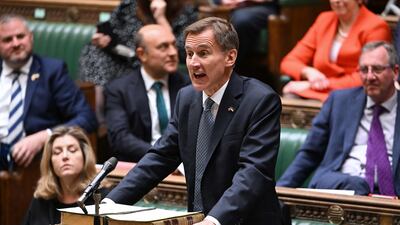 Britain's Chancellor Jeremy Hunt makes his autumn budget statement in the House of Commons. AFP