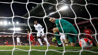 Liverpool's Mohamed Salah scores their second goal past West Ham United's Lukasz Fabianski. Reuters