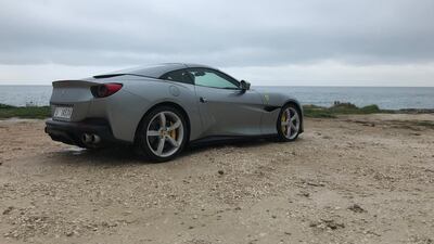 Its retractable aluminium hard top will stowitself away in 14 seconds at speeds of up to 40kph. Adam Workman / The National