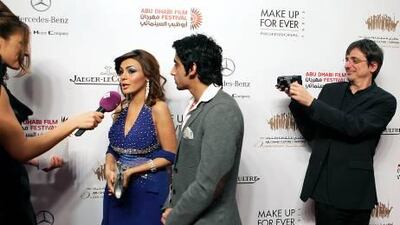 :The Canadian director Philippe Falardeau, right, films the actors Neven Madi and Omar Al Mulla at the opening night of the Abu Dhabi Film Festival at the Fairmont Bab Al Bahr on Thursday.