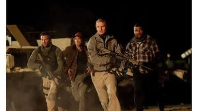 The A-Team from left, Face (Bradley Cooper), Murdock (Sharlto Copley), Hannibal (Liam Neeson) and BA Baracus (Quinton 'Rampage' Jackson).