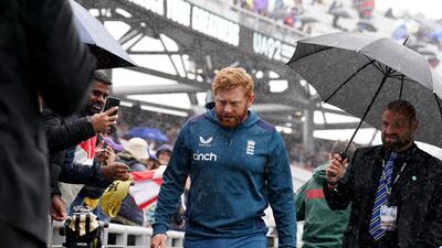 England's Jonny Bairstow returns to the dressing room as the rain starts again. PA