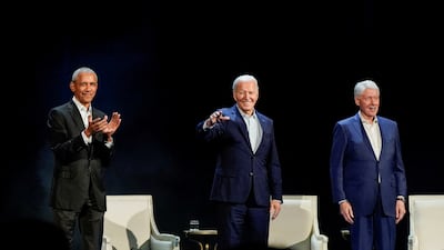 US President Joe Biden and former presidents Barack Obama and Bill Clinton at a campaign event in New York late on Thursday night. Reuters