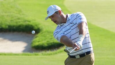 Bryson DeChambeau chips during a practice round for the PGA Championship at Southern Hills Country Club. USA TODAY Sports