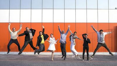 From left to right: Egyptian artist Chadi Adib Salawa, and Philippine artists Janos De La Cruz, Eugene Cubillo, Moreen Austria, Buds Convocar, Flordeliza Pesigan, JC Jacinto, and Sam Penaso, pose for a portrait before the opening for the Philippine Art Month.