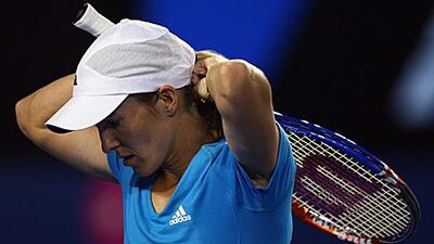 A pensive Justine Henin after losing a point to Serena Williams in yesterday's final.