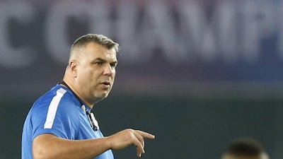 Al Ahli coach Cosmin Olaroiu could see his side close the gap on Arabian Gulf League leaders Al Ain to a point with victory away to Al Wasl on Monday, January 4, 2016. AFP