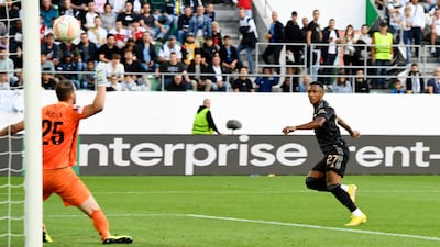 Marquinhos scores the first goal of the game. AP
