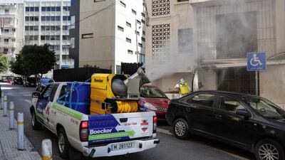 Municipality workers spray disinfectant in the Lebanese capital Beirut to prevent the spread of coronavirus on March 22, 2020. AFP