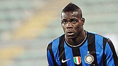 Inter Milan's Mario Balotelli threw his gloves on the ground and was slow to get up.