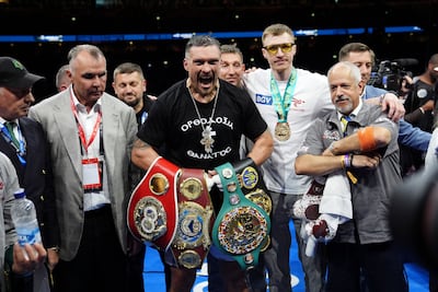 Oleksandr Usyk shows off his IBF, IBO, WBC and WBO world heavyweight titles after beating Daniel Dubois at Wembley Stadium on July 19, 2025. Getty Images