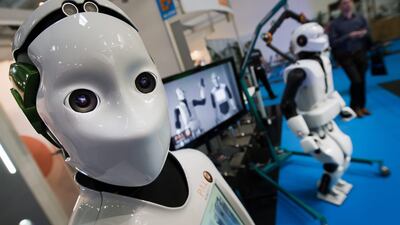 Readers wonder whether machines are making a negative impact on humans. Peter Kneffel / EPA
