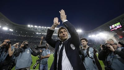 Former Juventus manager Antonio Conte shown applauding fans after leading the club to their third successive Serie A title in May 2014. Max Rossi / Reuters