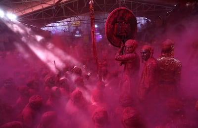 Hindu men from the villages of Nandgaon and Barsana Holi on March 15, 2019. EPA