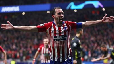 Diego Godin celebrates scoring Atletico Madrid's second goal. Reuters