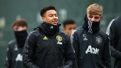 Jesse Lingard wraps up for the training session ahead of their game against Partizan on Thursday. PA