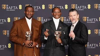 Hollywood actor Ethan Hawke, right, with award winners Akinola Davies Jr and Wale Davies. PA