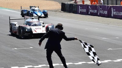 German driver Timo Bernhard crosses the finish line onboard his Porsche 919 Hybrid No 2 to win the 85th Le Mans 24-hours endurance race on June 18, 2017. AFP
