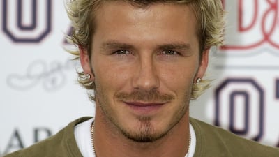 David Beckham, in a khaki knit and highlights, unveils his range of boys' clothing for DB07 at the Urbis Centre in Manchester, England, on September 19, 2002. Getty Images